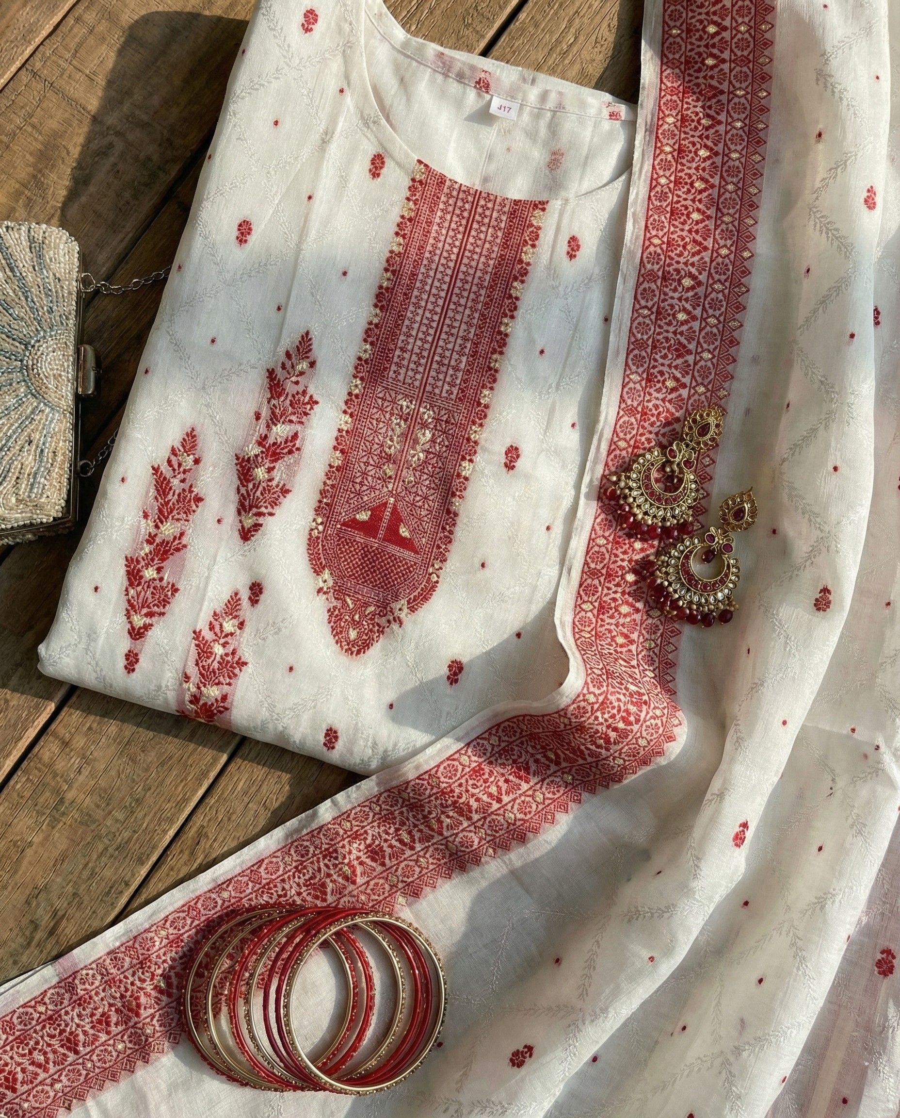 Ivory Jacquard Zari Unstitched Suit with Traditional Red Woven Motifs
