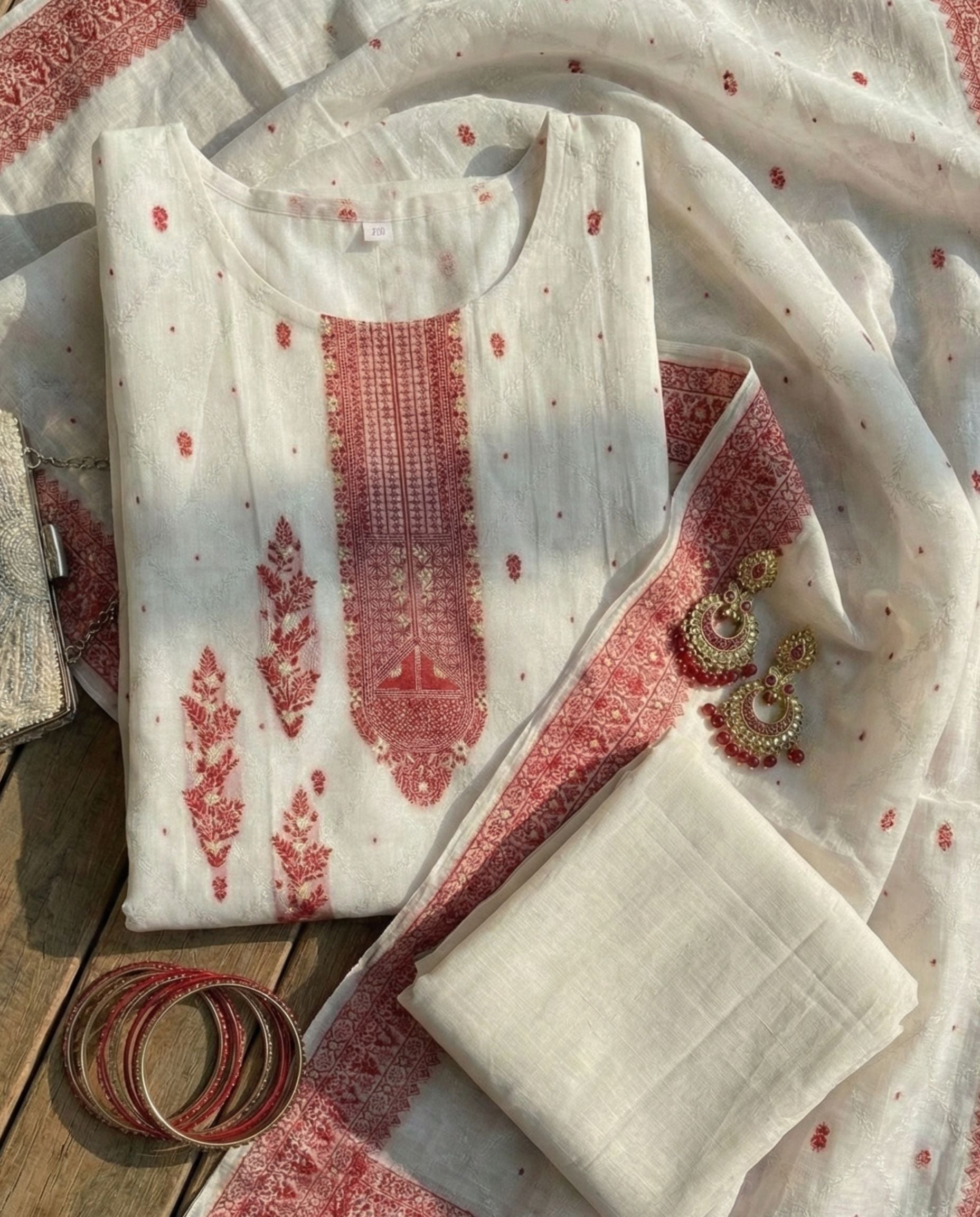 Ivory Jacquard Zari Unstitched Suit with Traditional Red Woven Motifs