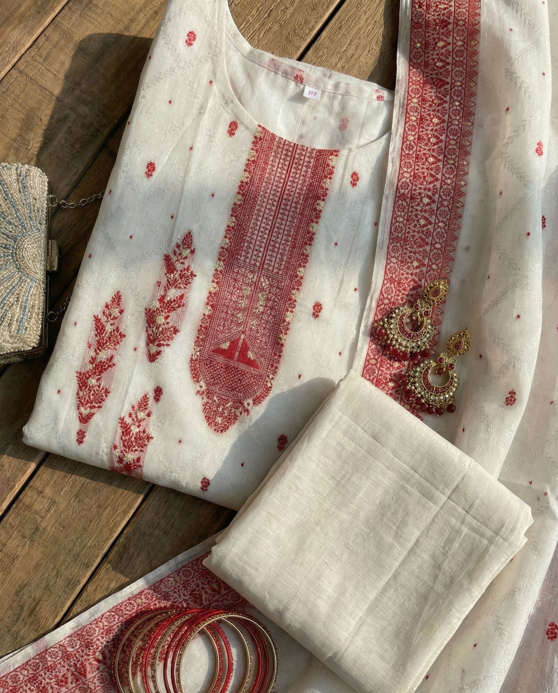 Ivory Jacquard Zari Unstitched Suit with Traditional Red Woven Motifs